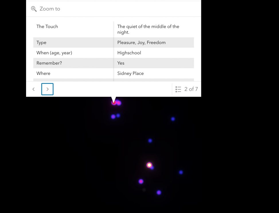 glowing pink and blue orbs on a black screen; a pop-up box detailing a moment in time, the narrator enjoying the quiet of the middle of the night.